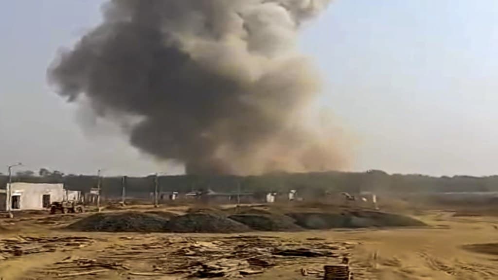 A blast is seen afar at the ordnance factory, in Bhandara district, Maharashtra, Friday, Jan. 24, 2025. (PTI Photo)