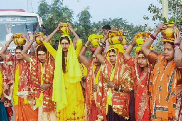 Devotees carrying the 'kalash' as a part of Maha Shivratri rituals, They return with the pious Ganga-jal after the shah-snan at Mahakumbh 2025.