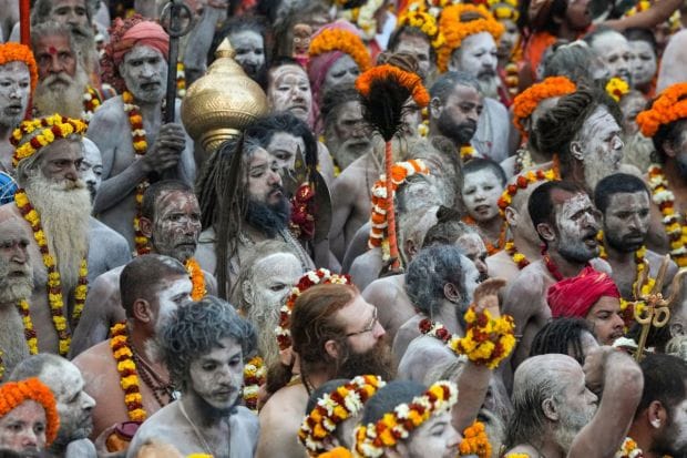 Sadhus take out a procession towards the Kashi Vishwanath temple to offer prayers on the occasion of Maha Shivratri, marking the concluding day of the Mahakumbh, (Image: PTI)