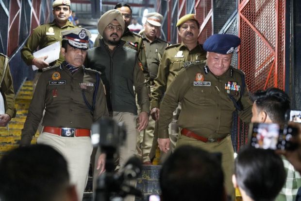 Robin Hibu, Special Commissioner in Delhi Police, and other senior officers at the New Delhi Railway Station, in New Delhi. Passengers of Swatantrata Senani Express and Bhubaneshwar Rajdhani were also present at platforms 12, 13 and 14 as the trains were delayed as stated by DCP Railways, KPS Malhotra. (Image: PTI)