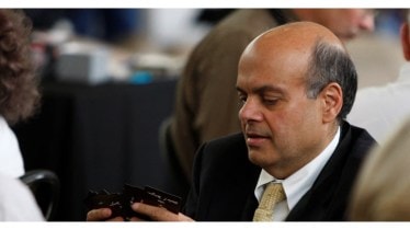 Warren Buffett pointed to a few pivotal decisions that shaped Berkshire Hathaway’s success one of the most important being the hiring of Ajit Jain.. (Image Source: Reuters)