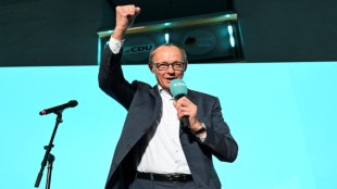 Christian Democratic Union (CDU) party leader Friedrich Merz speaks at the party headquarters, after the exit poll results are announced for the 2025 general election, in Berlin, Germany, February 23, 2025. REUTERS/Angelika Warmuth
