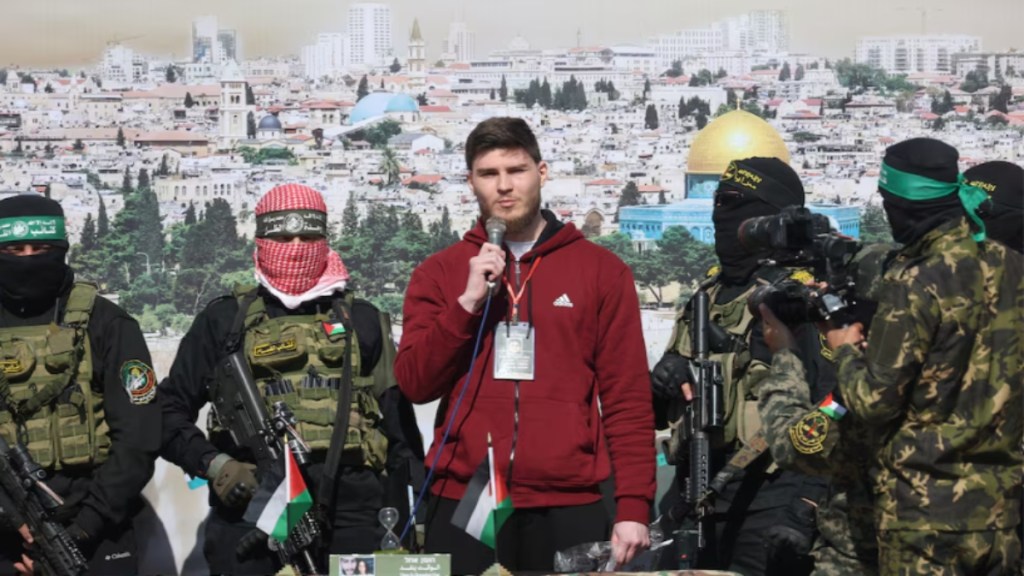 Russian-Israeli Sasha (Alexander) Troufanov, a hostage held in Gaza since the deadly October 7, 2023 attack, speaks as he is released by Palestinian Hamas and Islamic Jihad militants as part of a ceasefire and a hostages-prisoners swap deal between Hamas and Israel in Khan Younis, in the southern Gaza Strip, February 15, 2025. REUTERS/Ramadan Abed Russian-Israeli Sasha (Alexander) Troufanov, a hostage held in Gaza since the deadly October 7, 2023 attack, speaks as he is released by Palestinian Hamas and Islamic Jihad militants as part of a ceasefire and a hostages-prisoners swap deal between Hamas and Israel in Khan Younis, in the southern Gaza Strip, February 15, 2025. REUTERS/Ramadan Abed