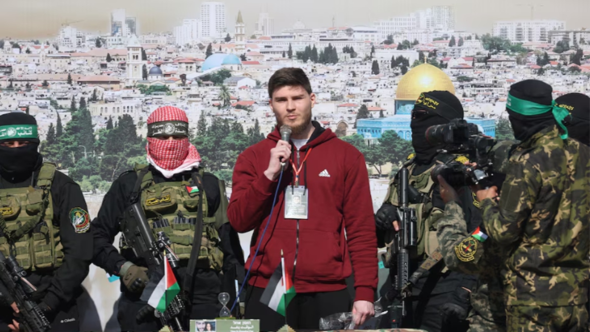 Russian-Israeli Sasha (Alexander) Troufanov, a hostage held in Gaza since the deadly October 7, 2023 attack, speaks as he is released by Palestinian Hamas and Islamic Jihad militants as part of a ceasefire and a hostages-prisoners swap deal between Hamas and Israel in Khan Younis, in the southern Gaza Strip, February 15, 2025. REUTERS/Ramadan Abed Russian-Israeli Sasha (Alexander) Troufanov, a hostage held in Gaza since the deadly October 7, 2023 attack, speaks as he is released by Palestinian Hamas and Islamic Jihad militants as part of a ceasefire and a hostages-prisoners swap deal between Hamas and Israel in Khan Younis, in the southern Gaza Strip, February 15, 2025. REUTERS/Ramadan Abed