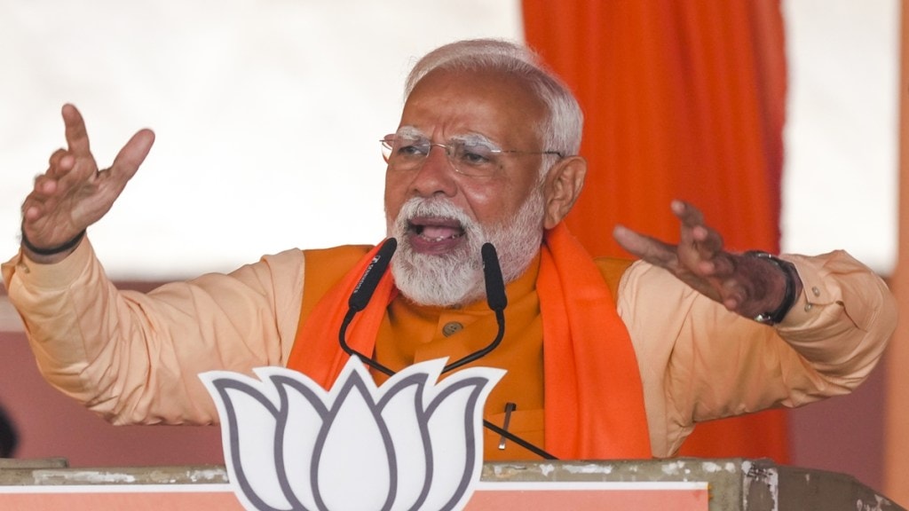 Prime Minister Narendra Modi addresses a public meeting ahead of the Delhi Assembly elections, at RK Puram in New Delhi, Sunday, Feb. 2, 2025. (PTI Photo)