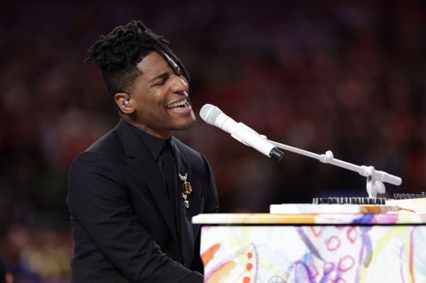 Among many music performances, John Batiste perfomed the national anthem on a piano painted by his wife undergoing treatment for cancer. (Image: PTI