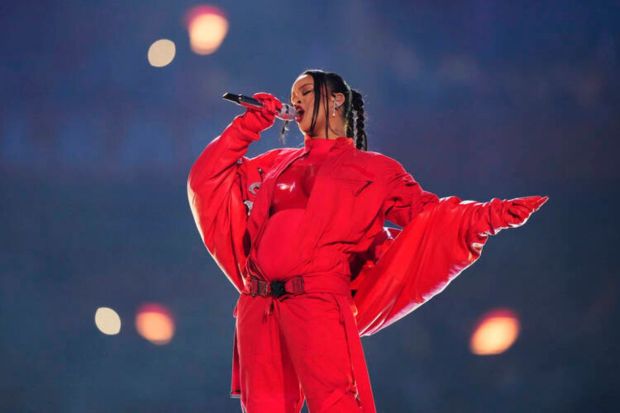 In 2023 Rihanna’s high-flying halftime show stunned viewers, but the real headline was her subtle yet powerful pregnancy announcement. (Image source: AP)