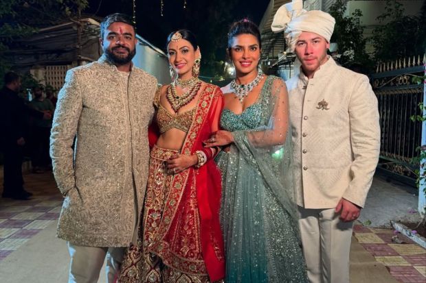 The happy couple with their fashion-icon sister and brother-in-law as they pose with their beaus. (Image: Instagram)