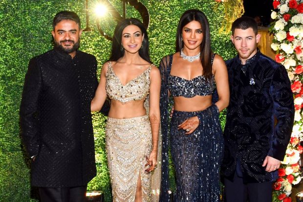 In a star-studded night, the couples pose for the papparazi as they grabbed eyeballs of the media with their glam. (Image: PTI)