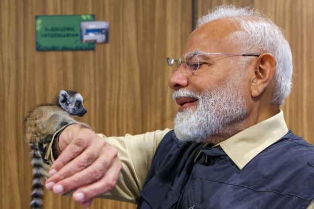 Showing his zeal for wildlife, he came face to face with a lemur and lovingly played with it. These rescued animals are closed monitored and cared for as per their natural habitat. (Image: PTI)
