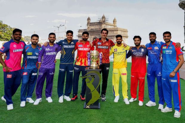 Team captains pose with the iconic IPL 2025 trophy ahead of the matches. This The 2 month long tournament starts on March 22 with finals on May 25 in Eden Garden, Kolkata. (Image: PTI)