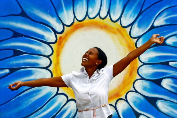 From the World Mental Health Day observed on October 10, a woman posed in front of a graffiti. WHO declared 