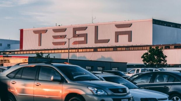 Tesla India entry, auto stocks, tariff war, import duties
