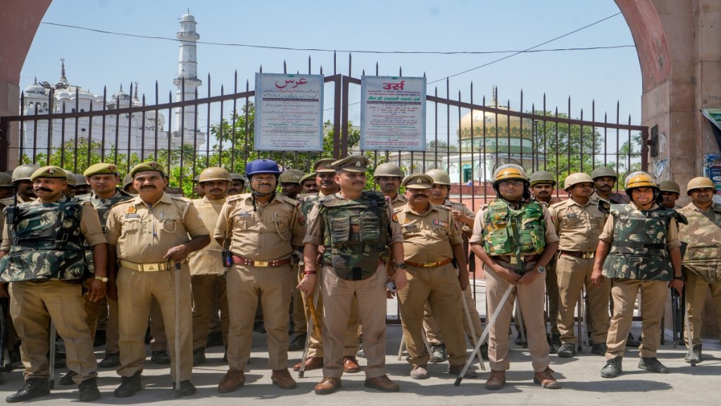 Police personnel stand guard outside Teele Wali Masjid, after the passage of the Waqf (Amendment) Bill, in Lucknow, Uttar Pradesh. Photo Credit: PTI