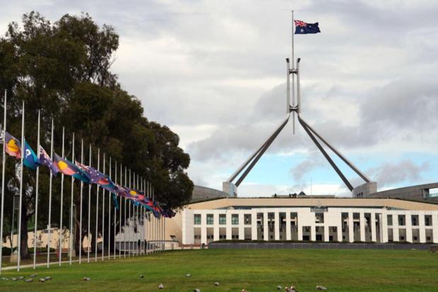 Flags are flown at half-staff at Parliament House following the death of Pope Francis, Canberra.