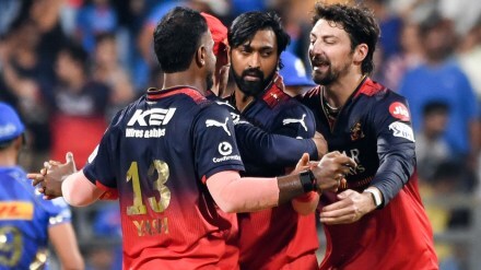 Royal Challengers Bengaluru's Krunal Pandya, Yash Dayal, and Tim David celebrate the team's victory. (Image Source: ANI / File Photo)