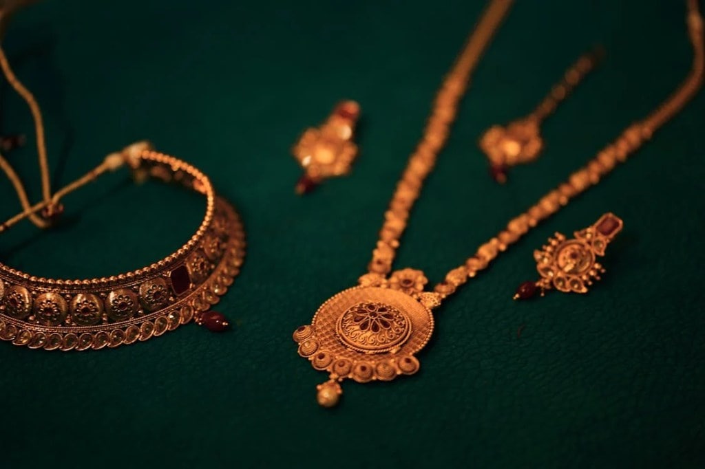 Gold prices soared to record a record high this week amid global uncertainties --- hitting the once-fabled Rs 1 lakh-mark for 10 grams. Gold prices soared to record a record high this week amid global uncertainties --- hitting the once-fabled Rs 1 lakh-mark for 10 grams.