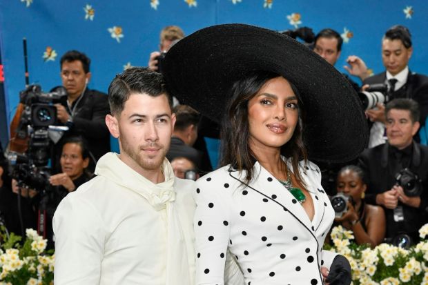 Pee-Cee with beau, Nick Jonas gave quite a power-couple show at the Met Gala 2025. Both wearing Valentino, PCJ flaunted a 11.6-carat Bulgari diamond necklace. (Image: AP)