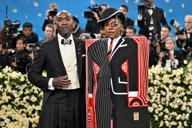 Janelle Monae for the Met Gala 2025 wore a custom Thome Browne Clock-Monocle. With its 