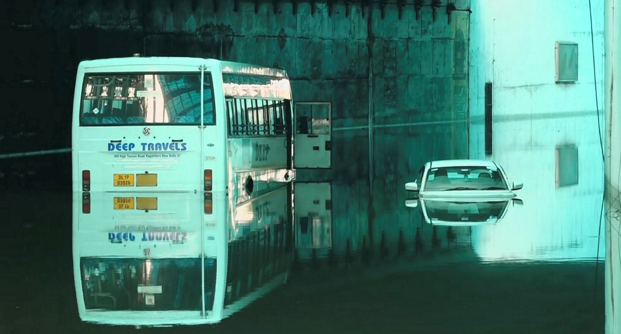 Vehicles partially submerged following rains, at an underpass at Delhi Cantt area on Sunday