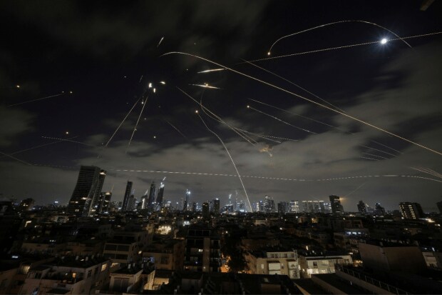 On Friday, June 13, Israel launched airstrikes on Iran, targeting multiple nuclear and military facilities under what Prime Minister Benjamin Netanyahu called “Operation Rising Lion”.  It is one of the biggest attacks on Iran in decades, as an attempt to remove the “nuclear threat” to Israel. On Sunday, Israel launched an expanded assault on Iran with direct strikes targeting its energy industry and Defence Ministry headquarters. The two countries entered into the fourth day of the conflict on Monday, with Iran launching a new wave of missile attacks on Israel. (Photo Source - AP/PTI)