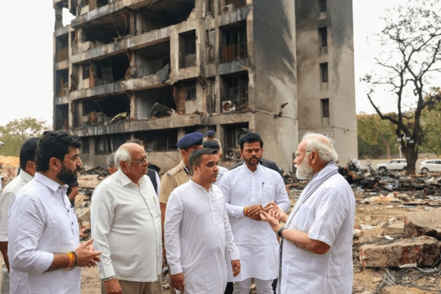 Prime Minister Narendra Modi visited the crash site on Friday and also paid a visit to the Ahmedabad Civil Hospital to talk to victims and officials on ground. (Photo Source - X)