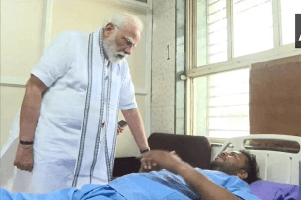 Prime Minister Narendra Modi on Friday met those injured in the Air India plane crash at the civil hospital in Ahmedabad.He also met Vishwas Kumar Ramesh, the lone survivor of the tragedy. (Photo Source - ANI)