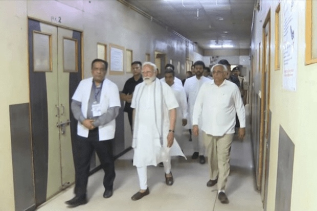 The Prime Minister has visited the civil hospital where victims of a plane crash are being treated and expressed condolences to them. (Photo Source - PTI)