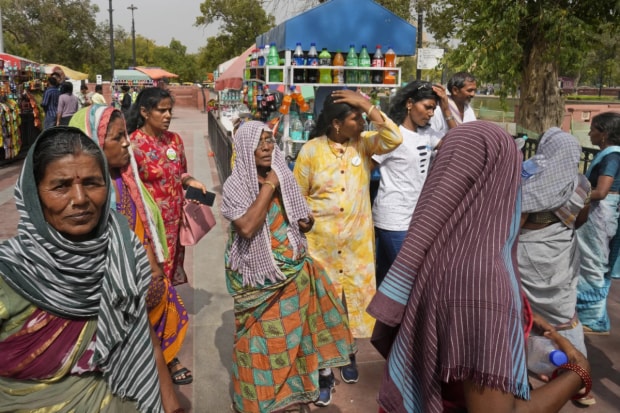 Red Alert in Delhi: The IMD had issued a red alert in Delhi due to a spike in humidity level which led to soaring temperature in the national capital. The 'feel-like' temperature was at 50 degree Celsius. (Photo Source - AP)
