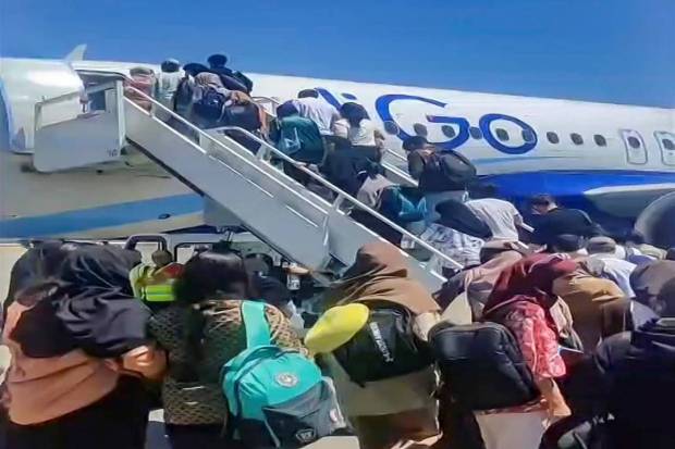 Indian students wait to board a flight to return to India under an evacuation operation facilitated by the Government of India, at Yerevan International Airport, in Armenia, Wednesday, June 18, 2025. (Photo source: PTI)
