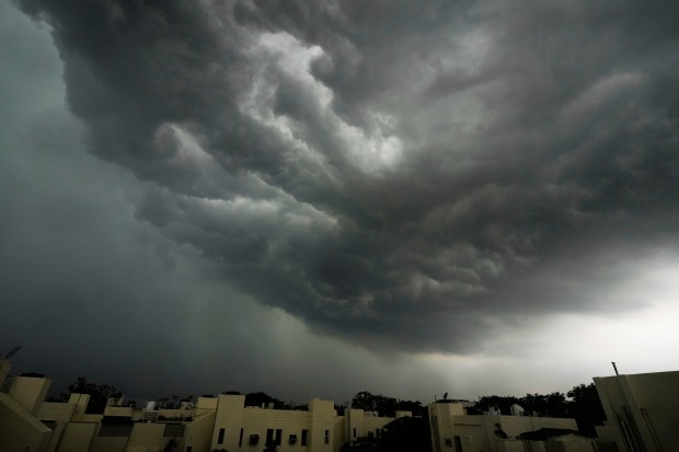 Monsoon clouds gather over New Delhi’s skyline. (AP Photo)