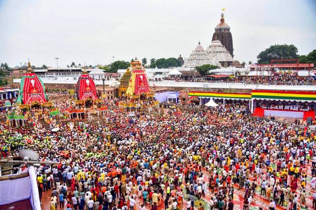 People pull the chariots of Lord Jagannath, Lord Balabhadra and Goddess Subhadra in Puri. (Photo source: PTI)