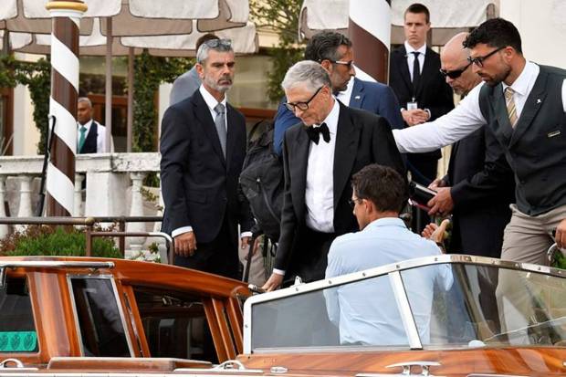 Bill Gates leaves a hotel ahead of the wedding celebrations. (Photo source: AP)