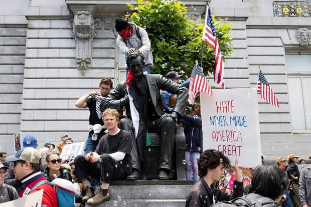 Demonstrators gather at a statue of Abraham Lincoln. (Photo source: AP)