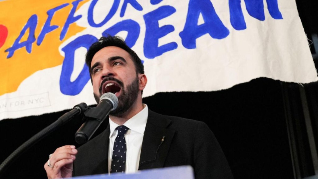 As a pro-immigrant candidate, Mamdani pushes back on anti-refugee sentiment and Trump-era policies like the Muslim ban. As a pro-immigrant candidate, Mamdani pushes back on anti-refugee sentiment and Trump-era policies like the Muslim ban.