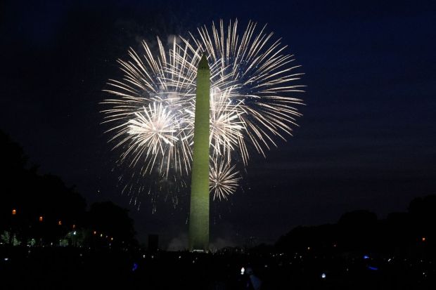 Fireworks explode near the Washington Monument lighting up the sky on the fourth of July night. All 51 states lit up with fireworks last night. (Image: AP)