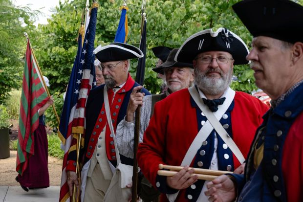 Members of the Sons of the American Revolution gather as a color guard ahead of a naturalization ceremony during Independence Day observation at Locust Grove, a National Historic Landmark. (Image: AP)