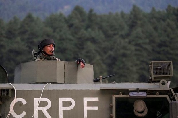 A security official stands guard as the first group of pilgrims departs from the Nunwan base camp in Pahalgam for the annual Amarnath Yatra on Thursday, July 3, 2025. (Image Source: PTI)