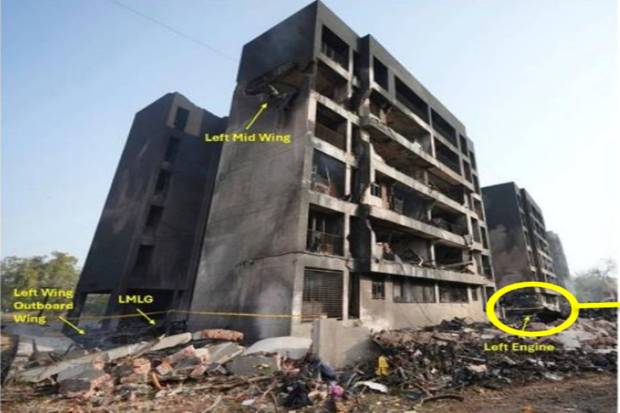 The left main landing gear and mid left section were immersed in the upper floors of Building C. In the image, the aircraft continued to be largely intact before impacting several structures. (Photo source: AAIB)