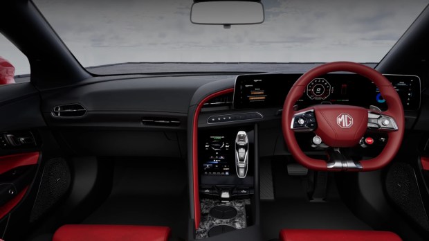 The Cyberster gets a high-tech cockpit with three digital displays — a central 10.25-inch infotainment touchscreen flanked by two 7-inch screens.