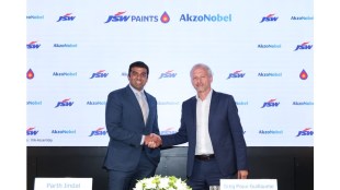 (L-R) Mr. Parth Jindal, Managing Director, JSW Paints shakes hand with Mr. Greg Poux-Guillaume, CEO, AkzoNobel during a joint press conference in Mumbai on Tuesday. Photo Credit: JSW Paints