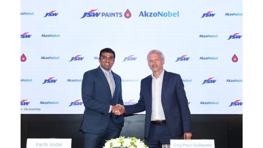 (L-R) Mr. Parth Jindal, Managing Director, JSW Paints shakes hand with Mr. Greg Poux-Guillaume, CEO, AkzoNobel during a joint press conference in Mumbai on Tuesday. Photo Credit: JSW Paints (L-R) Mr. Parth Jindal, Managing Director, JSW Paints shakes hand with Mr. Greg Poux-Guillaume, CEO, AkzoNobel during a joint press conference in Mumbai on Tuesday. Photo Credit: JSW Paints