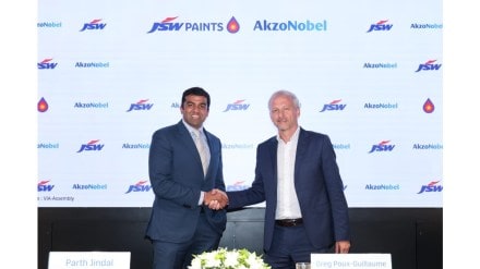 (L-R) Mr. Parth Jindal, Managing Director, JSW Paints shakes hand with Mr. Greg Poux-Guillaume, CEO, AkzoNobel during a joint press conference in Mumbai on Tuesday. Photo Credit: JSW Paints