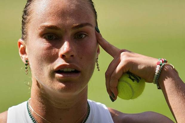 Aryna Sabalenka of Belarus reacts as she plays Amanda Anisimova of the U.S. during a women's singles semifinal match at the Wimbledon Tennis Championships in London. (Photo source: AP)