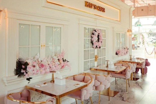 The Kaps Cafe is an aesthetic delight - baby pink sofas, blooming floral arrangements, crystal chandeliers, and soft lighting make it the perfect place to unwind, chat, and sip something warm. (Image credit: Kap’s Cafe Instagram)