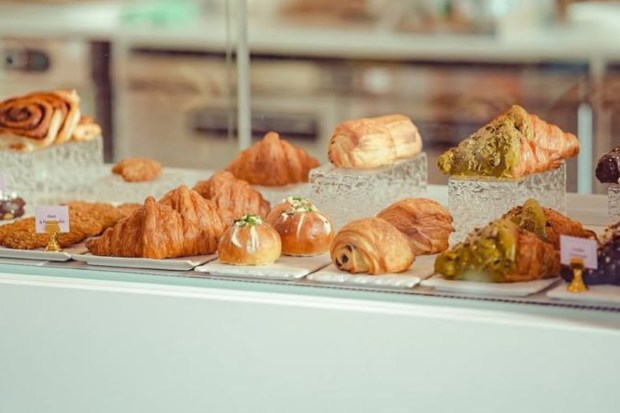 Whether you’re in the mood for a flaky croissant, a fudgy brownie, or a slice of zesty lemon pistachio cake, The Kaps Cafe promises a dessert spread that’s as delightful as its decor. (Image credit: Kap’s Cafe Instagram)