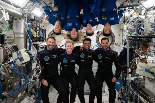 The two crews took part in a group photo session aboard the ISS, smiling in their flight suits as they prepared for the journey home. (Image: Jonny Kim's X)