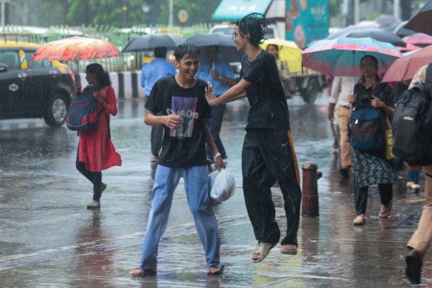 Mumbai is bracing for heavy rain and high tides as the IMD issues a yellow alert. The city can expect cloudy skies, light to moderate showers, and mild temperatures in the coming days.