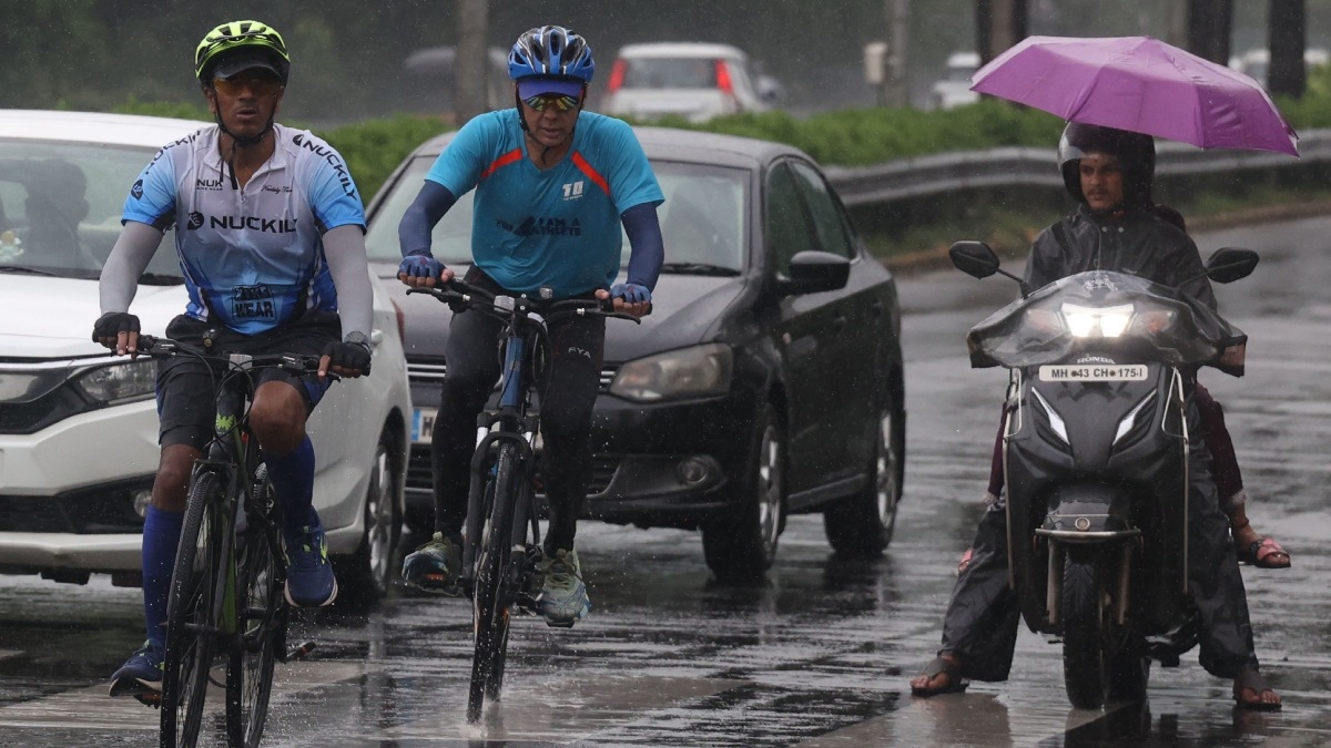 In Photos: Mumbai on edge as IMD issues orange alert, high tide warning in effect