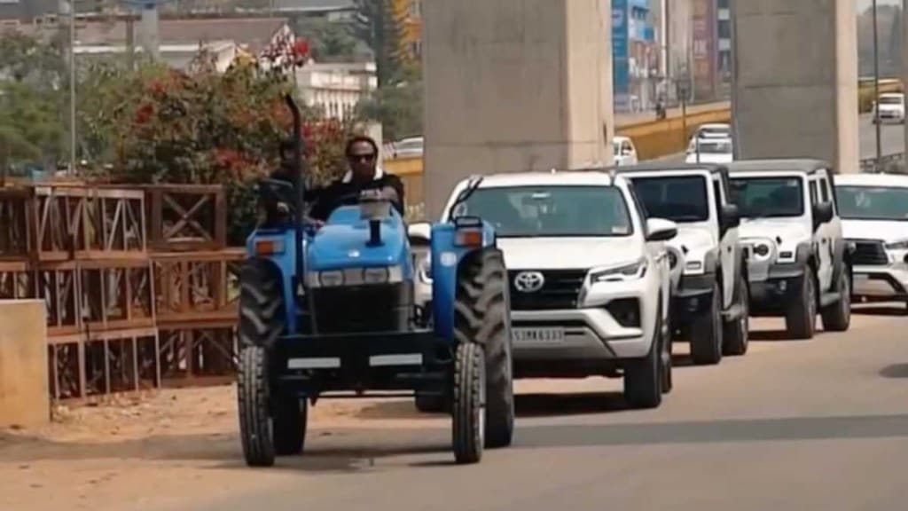 From fields to fortune: Farmer rolls up on a tractor to buy a Land Rover Defender